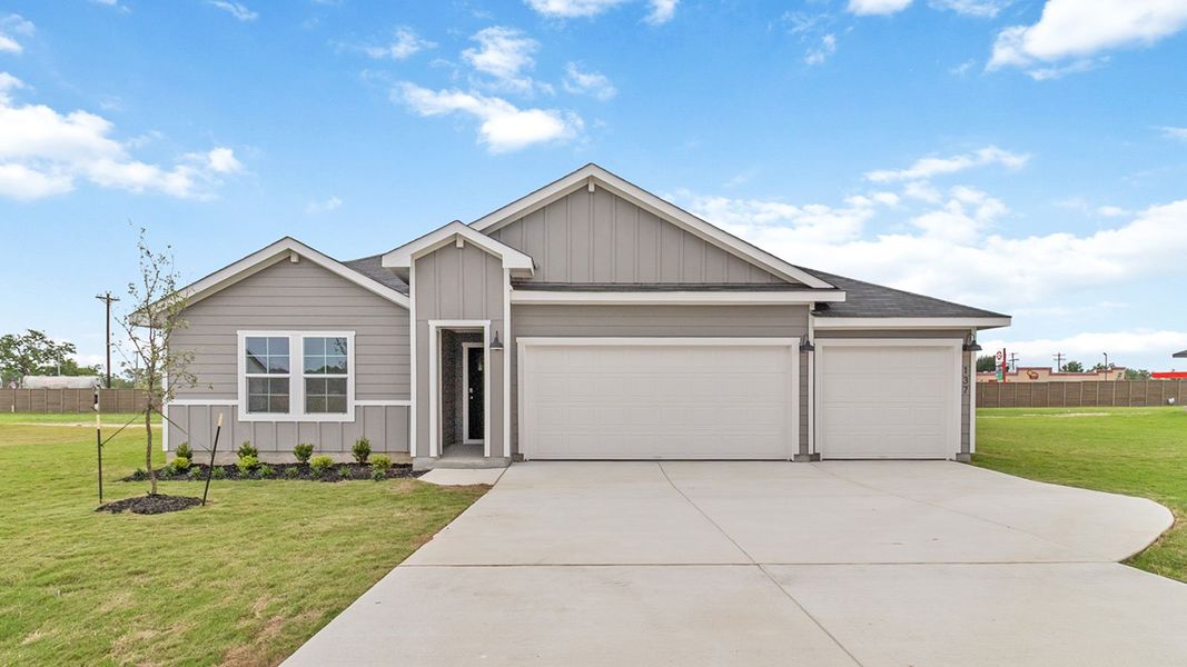 Front exterior of a new home in Railhead, Cedar Creek, TX, highlighting curb appeal (Image 1). Front exterior of a new home in Railhead, Cedar Creek, TX, highlighting curb appeal (Image 1).