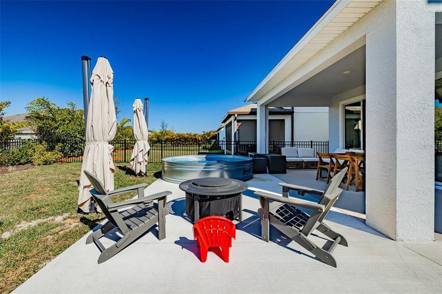 Exterior details and patio area of a home in Waterset Garden Series, Apollo Beach (Image 27).