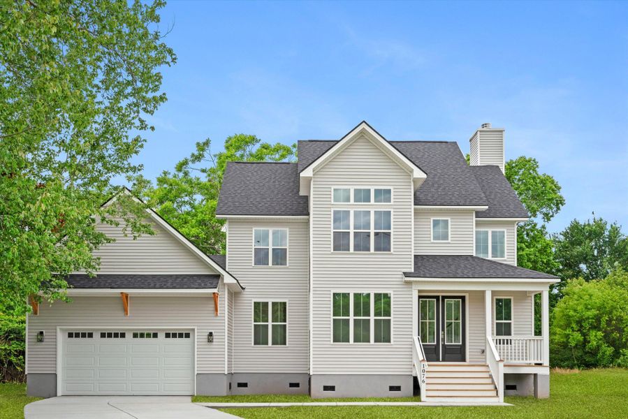 Front exterior of a new home in , Charleston, SC, highlighting curb appeal (Image 1).