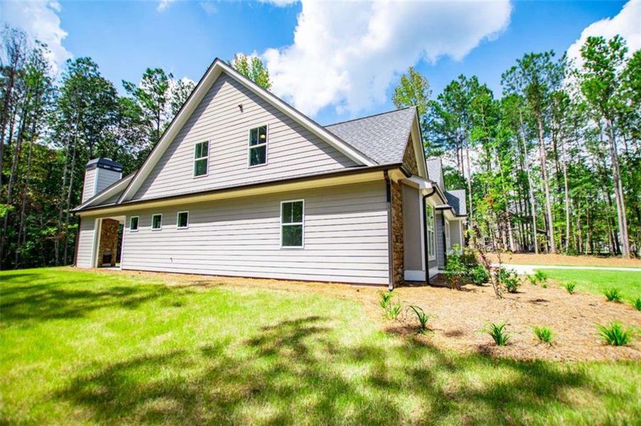 Front exterior of a new home in , Douglasville, GA, highlighting curb appeal (Image 27).