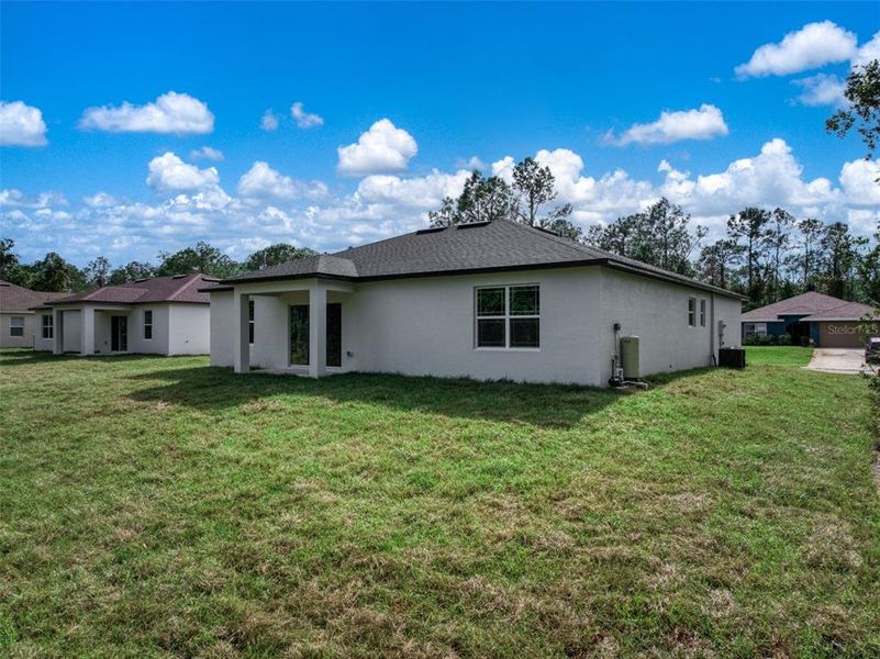 Exterior details and patio area of a home in , Sebring (Image 4).