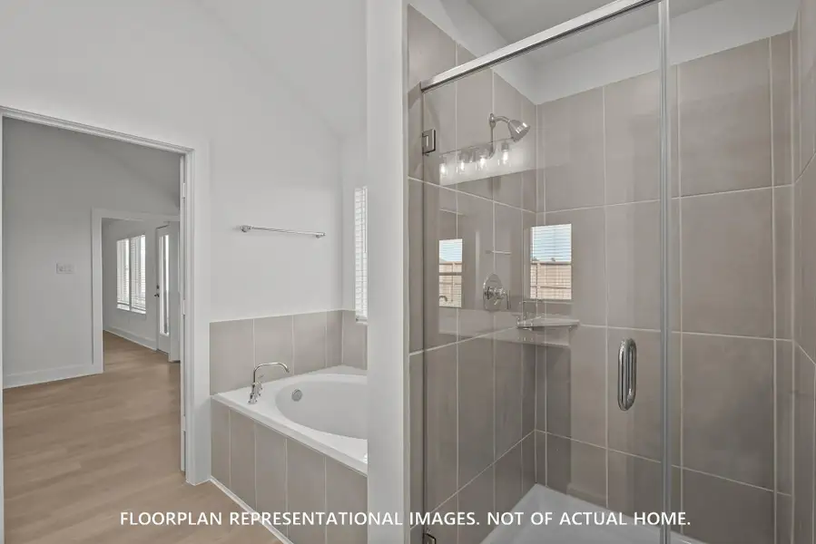 Furnished interior view inside a new home in Pinewood at Grand Texas, New Caney (Image 8).