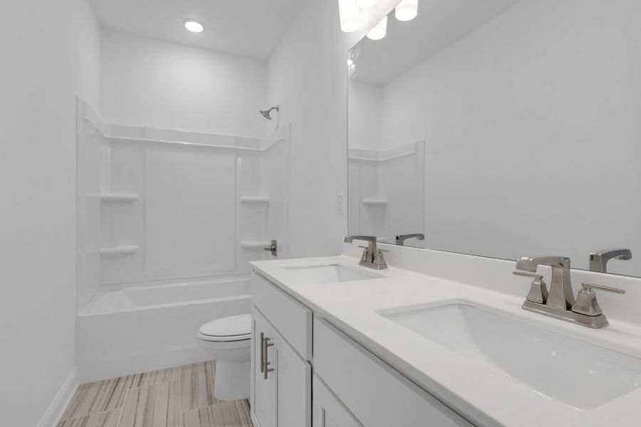 Representative furnished interior of a home built from the Canton by UnionMain Homes in Three Rivers, Rome (Image 7).