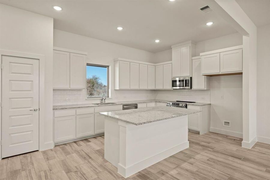 Furnished interior view inside a new home in Saddleback Estates, Boyd (Image 4).