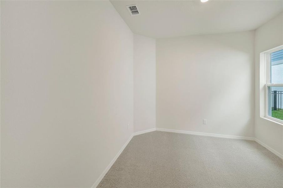 Spacious, unfurnished interior of a new home in Waterset Tradition Series, Apollo Beach (Image 24).