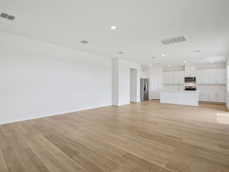 Spacious, unfurnished interior of a new home in Coasterra - Reserve Series, Palmetto (Image 11).