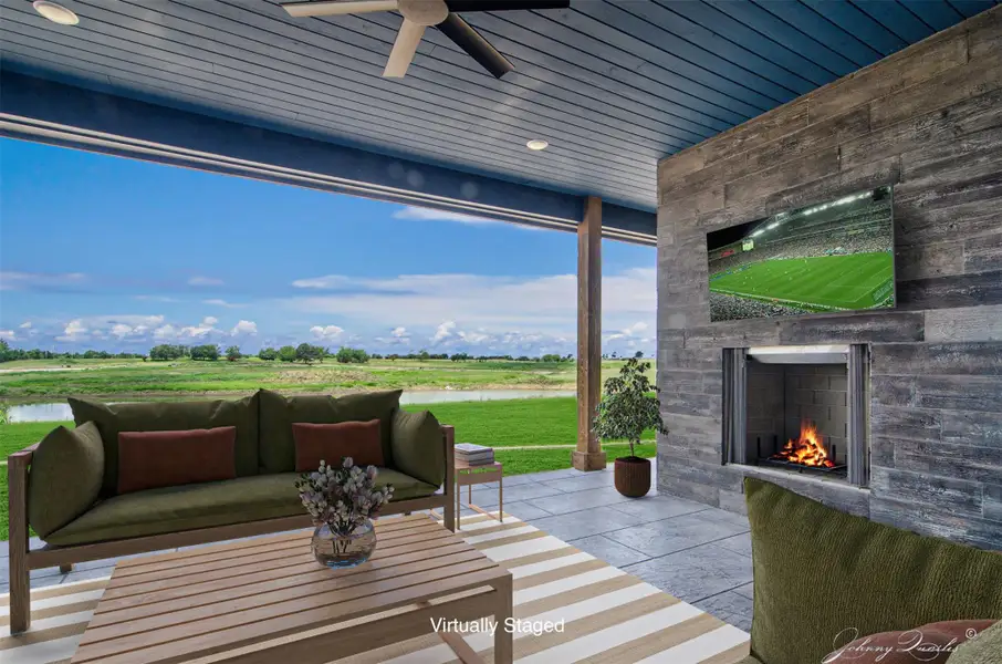 Rear porch with wood burning fireplace prepped for gas logs or a log starter Rear porch with wood burning fireplace prepped for gas logs or a log starter