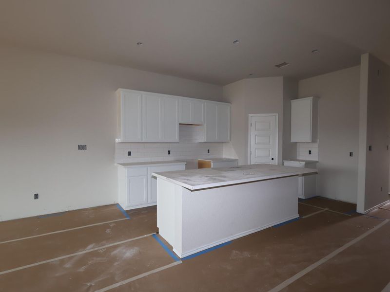 In-progress construction of a new home in Carillon, Manor, TX (Image 17).