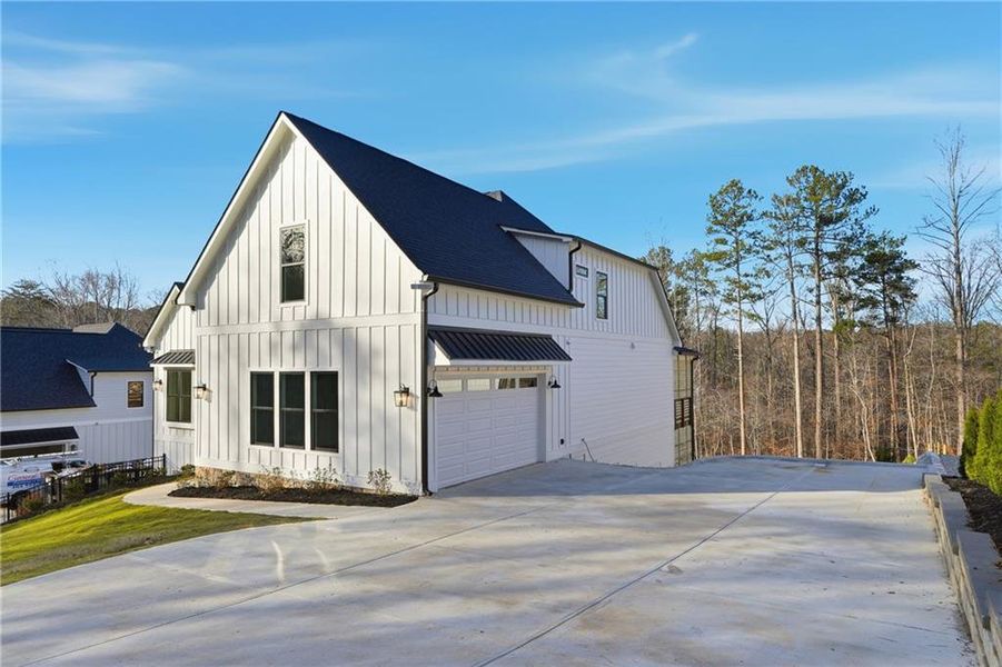 Front exterior of a new home in , Cumming, GA, highlighting curb appeal (Image 27).