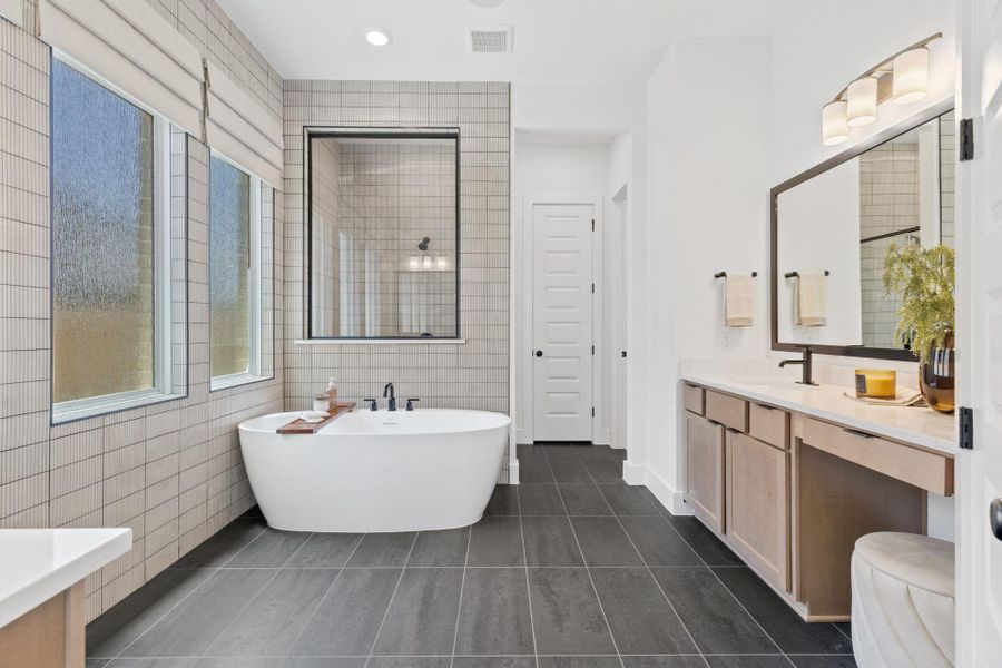 Primary Bath retreat with dual vanities & soaking tub - Representative Photo