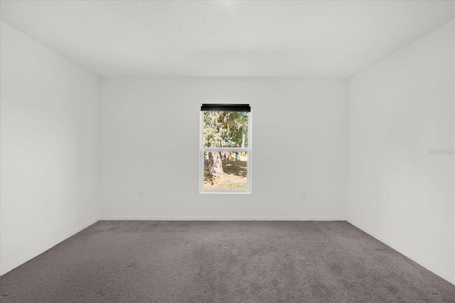 Spacious, unfurnished interior of a new home in Poinciana Village, Kissimmee (Image 15).