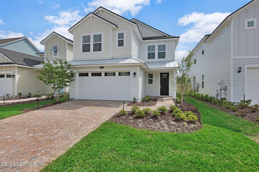 Front exterior of a new home in Seabrook Village at Seabrook, Nocatee, FL, highlighting curb appeal (Image 27).