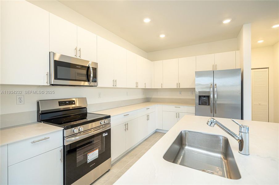 Furnished interior view inside a new home in Acacia Groves, Miami (Image 14).