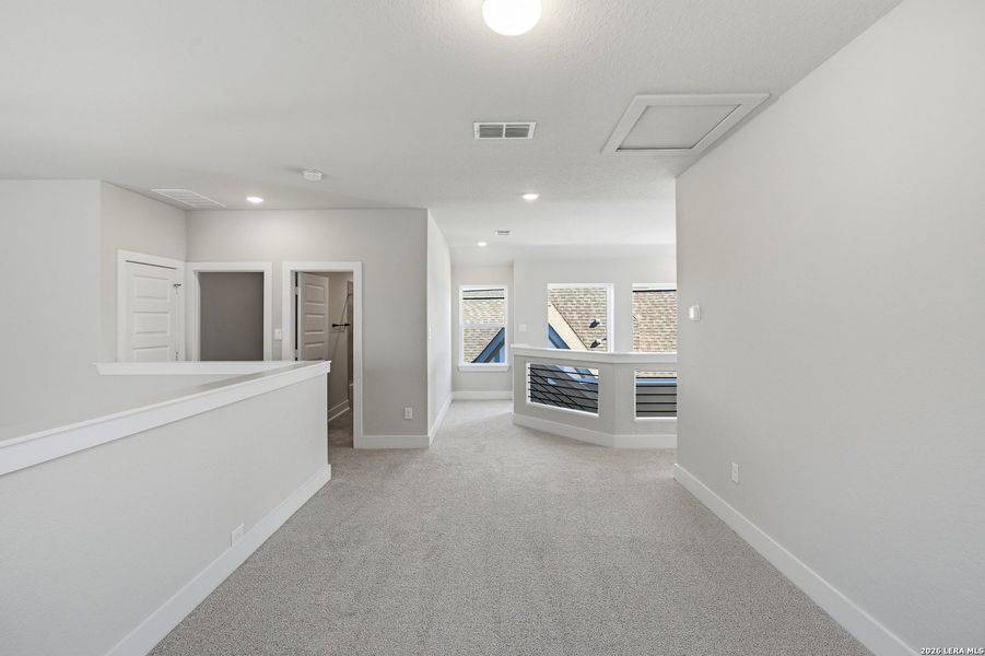 Spacious, unfurnished interior of a new home in Stillwater Ranch, San Antonio (Image 42).