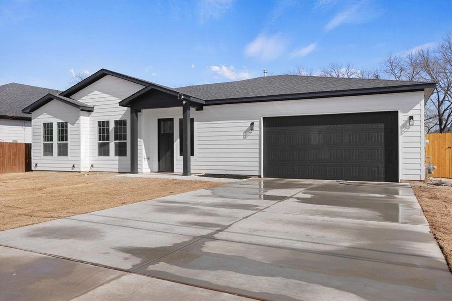 Front exterior of a new home in , Dallas, TX, highlighting curb appeal (Image 2). Front exterior of a new home in , Dallas, TX, highlighting curb appeal (Image 2).