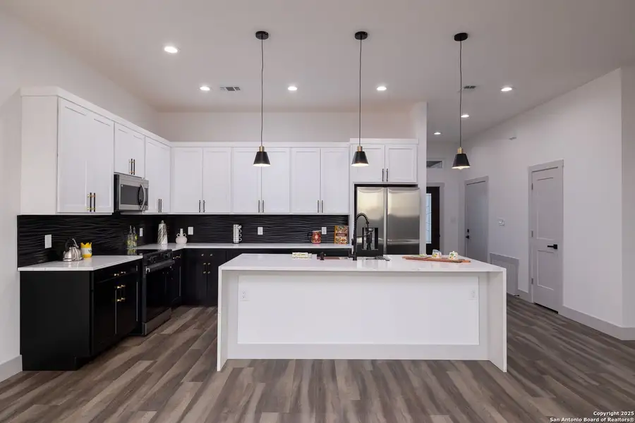 Furnished interior view inside a new home in , Fischer (Image 5).