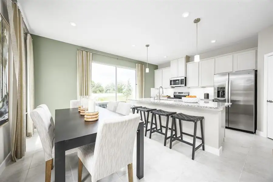 Representative furnished interior of a home built from the Mayshore by Ryan Homes in Pine Pointe at Astonia, Davenport (Image 6).