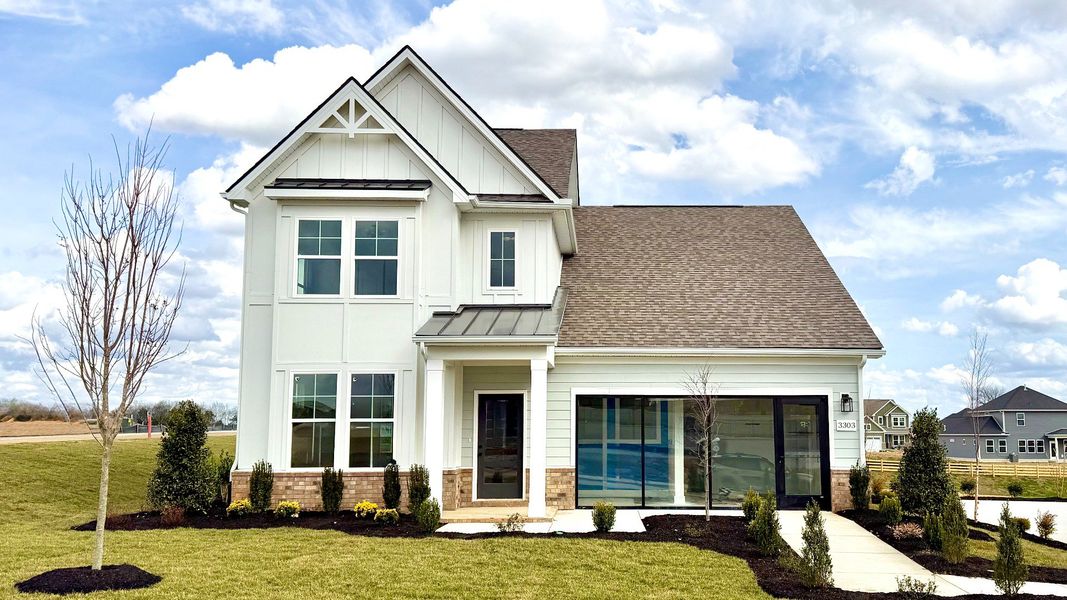 Representative exterior photo of a completed home built from the Lassiter by DRB Homes in McClure Farms, Columbia, TN (Image 7). Representative exterior photo of a completed home built from the Lassiter by DRB Homes in McClure Farms, Columbia, TN (Image 7).