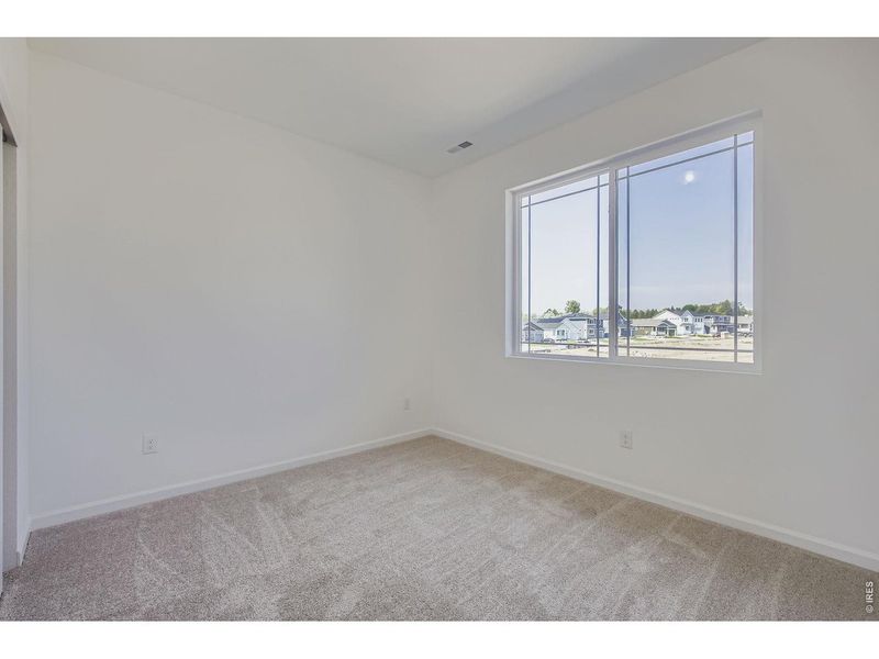 Spacious, unfurnished interior of a new home in Country Club Reserve, Fort Collins (Image 38).