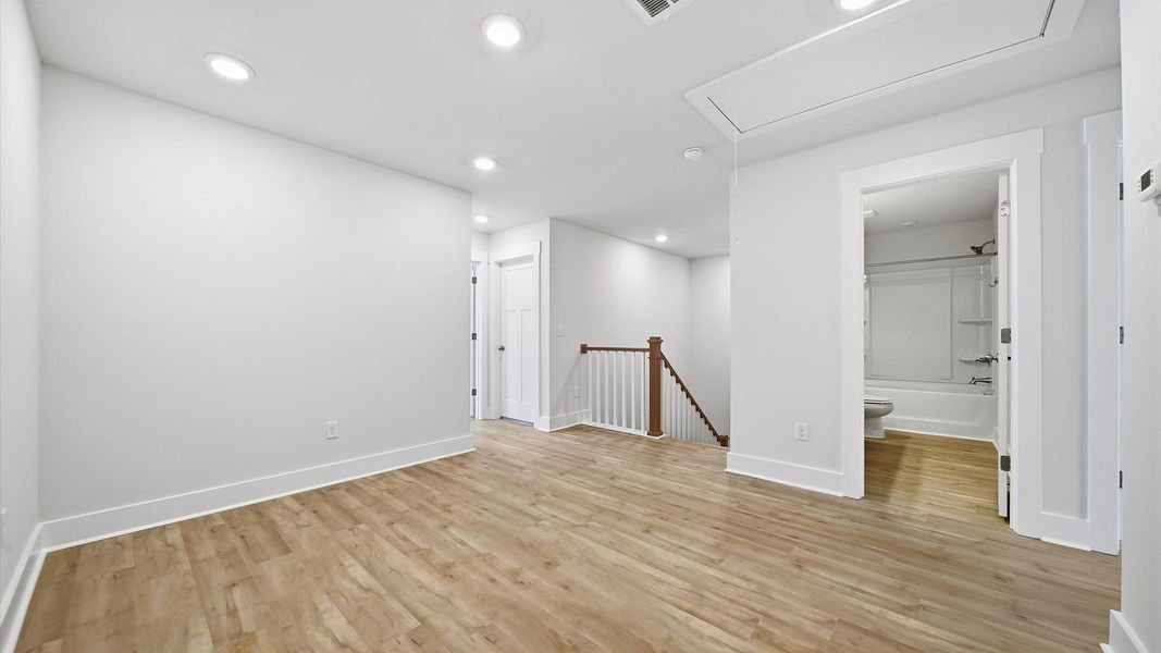 Modern loft with hardwood flooring and an open feel that enhances everyday living Modern loft with hardwood flooring and an open feel that enhances everyday living