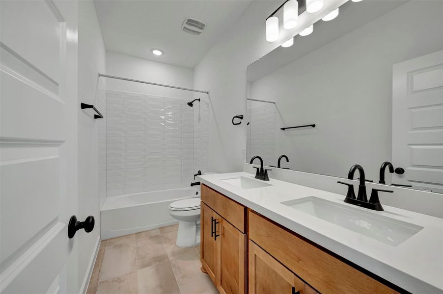 Furnished interior view inside a new home in Heritage, Dripping Springs (Image 8).