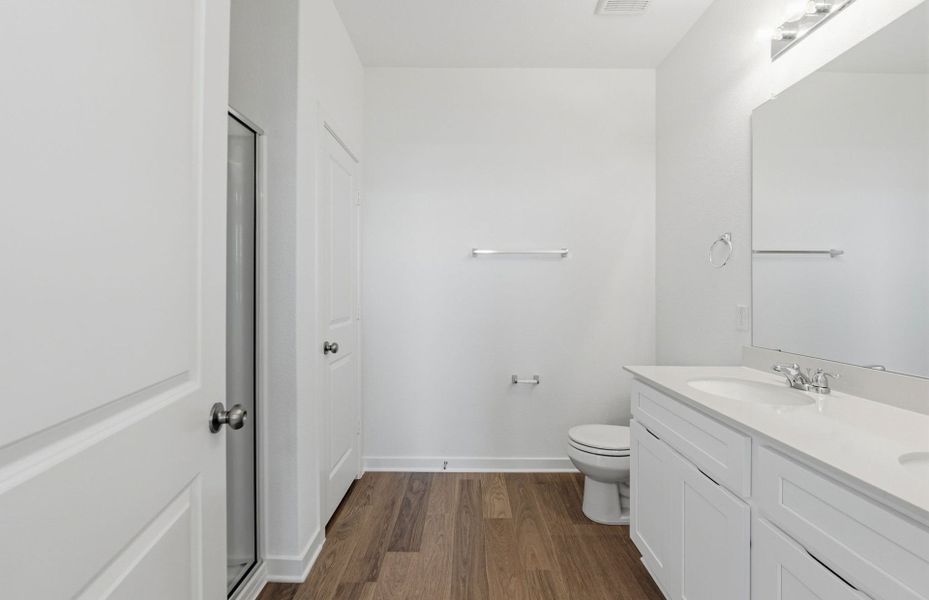 Furnished interior view inside a new home in Crosswinds, Kyle (Image 12).