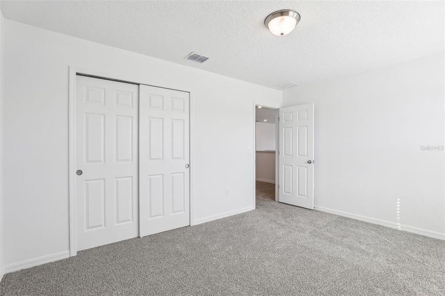 Spacious, unfurnished interior of a new home in Lake Deer Estates - Signature Series, Poinciana (Image 30). Spacious, unfurnished interior of a new home in Lake Deer Estates - Signature Series, Poinciana (Image 30).