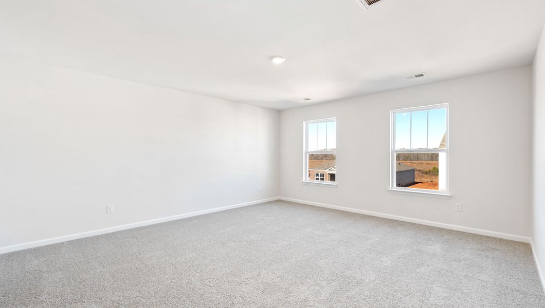 Spacious, unfurnished interior of a new home in Magnolia at the Bluffs Phase 3, Freeport (Image 25).