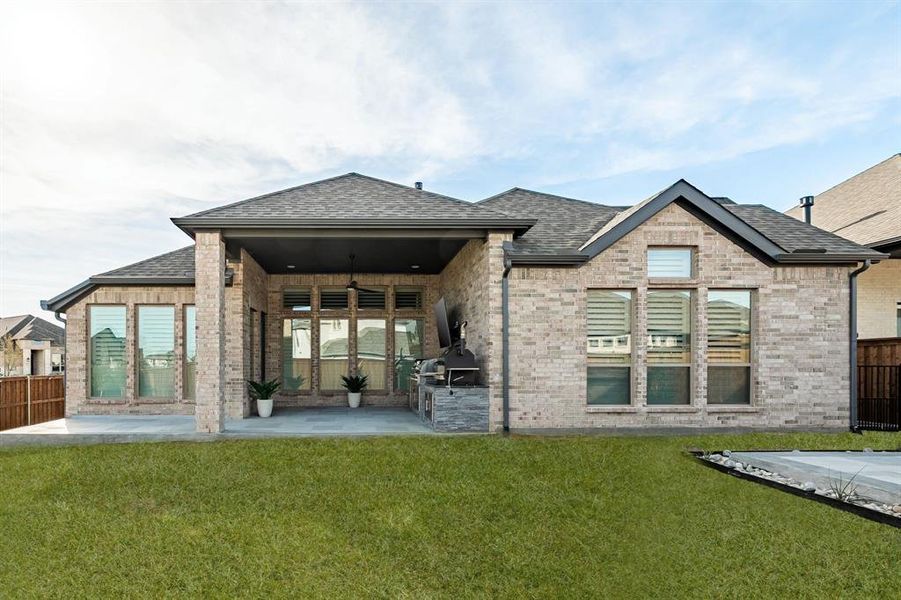 Exterior details and patio area of a home in Trinity Falls, McKinney (Image 4).