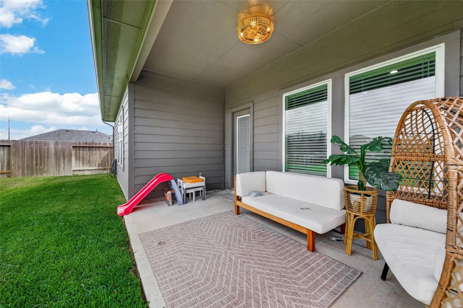Exterior details and patio area of a home in Grand Pines, Magnolia (Image 4).