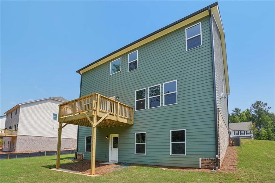 Front exterior of a new home in , Locust Grove, GA, highlighting curb appeal (Image 19).
