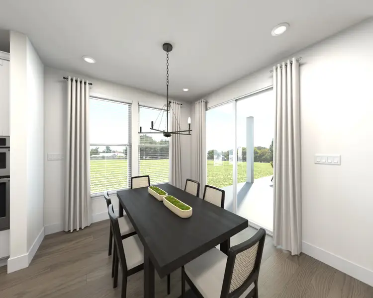 The open-concept floorplan allows for an easy flow between the kitchen and dining areas.