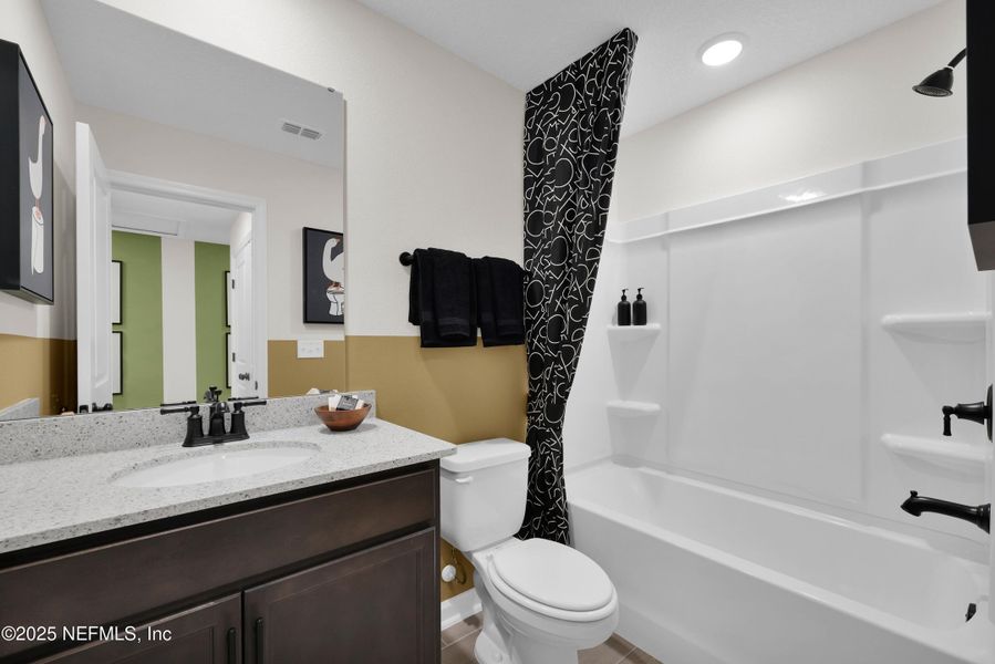 Furnished interior view inside a new home in Baxley Villas, Middleburg (Image 15).