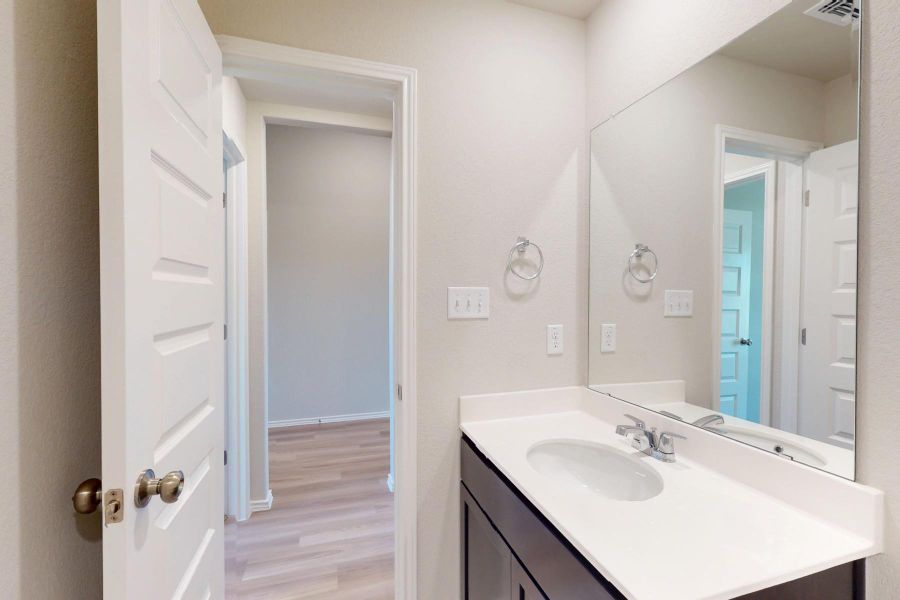 Furnished interior view inside a new home in Carillon, Manor (Image 12).
