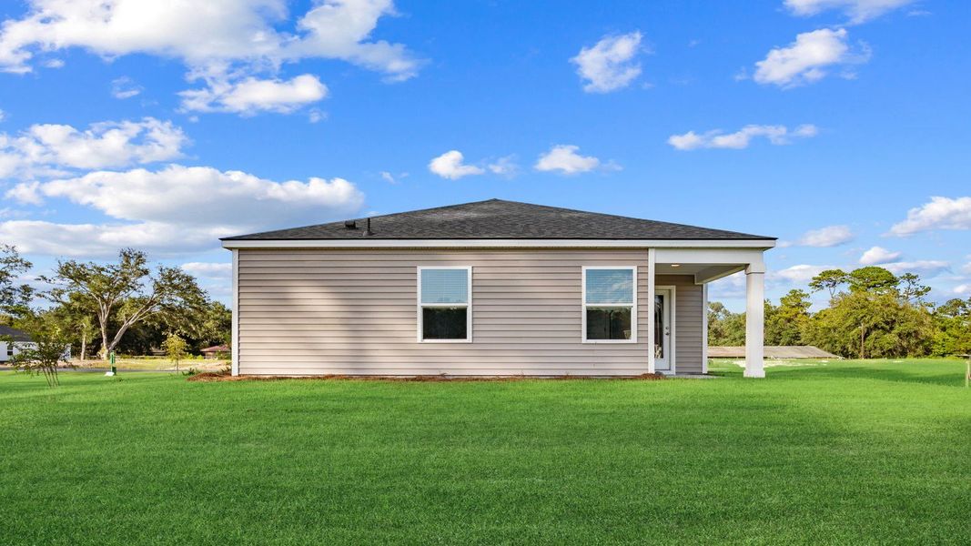 Exterior details and patio area of a home in The Groves at Bees Creek, Ridgeland (Image 3).