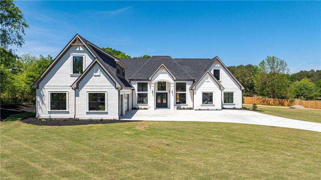 Front exterior of a new home in , Monroe, GA, highlighting curb appeal (Image 41).