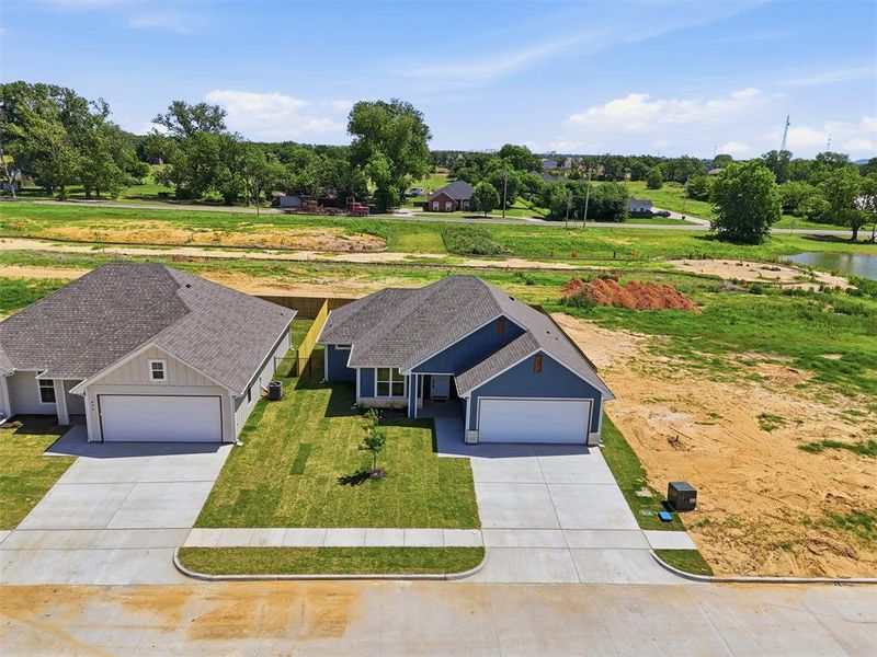 Front exterior of a new home in , Tolar, TX, highlighting curb appeal (Image 29).