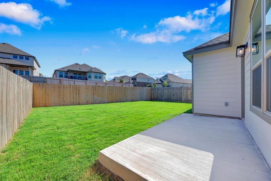 Front exterior of a new home in Retreat at San Gabriel, Georgetown, TX, highlighting curb appeal (Image 25).