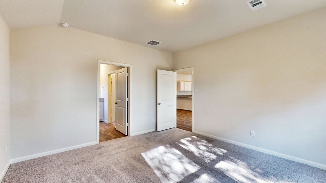 A room with a rug and a carpet. A room with a rug and a carpet.