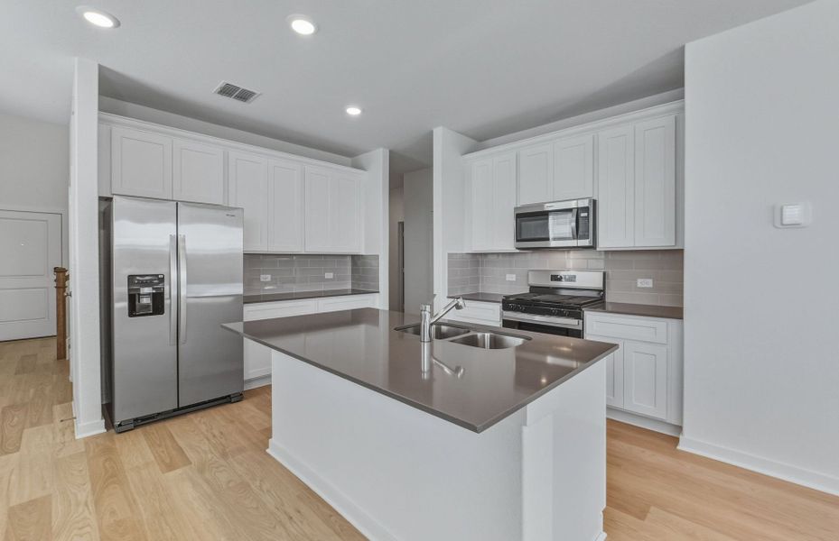 Furnished interior view inside a new home in Sunfield, Buda (Image 5). Furnished interior view inside a new home in Sunfield, Buda (Image 5).