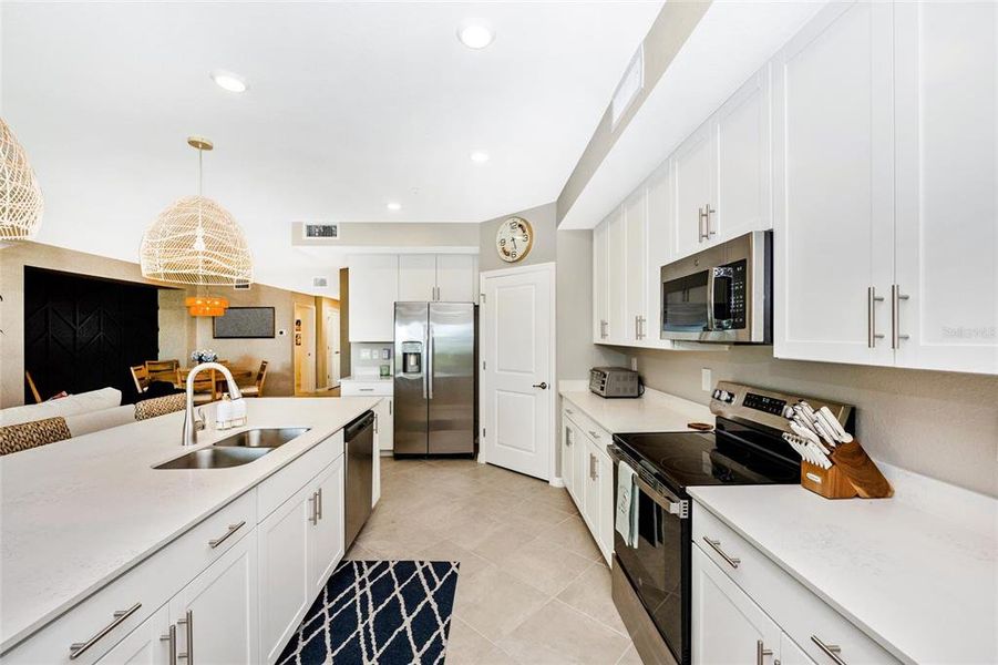 Furnished interior view inside a new home in Wellen Park Golf & Country Club, Venice (Image 35).