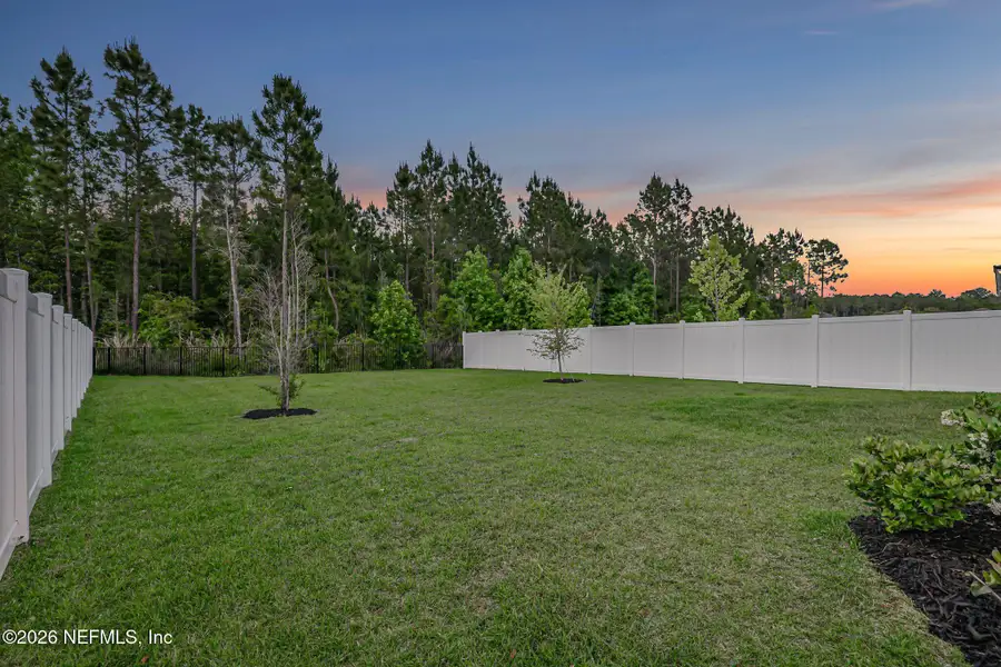 Exterior details and patio area of a home in Cross Creek, Green Cove Springs (Image 28).