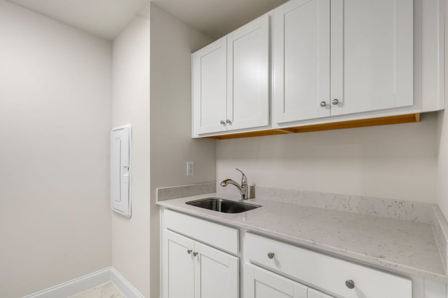 Laundry - shown with optional cabinets and laundry sink Laundry - shown with optional cabinets and laundry sink