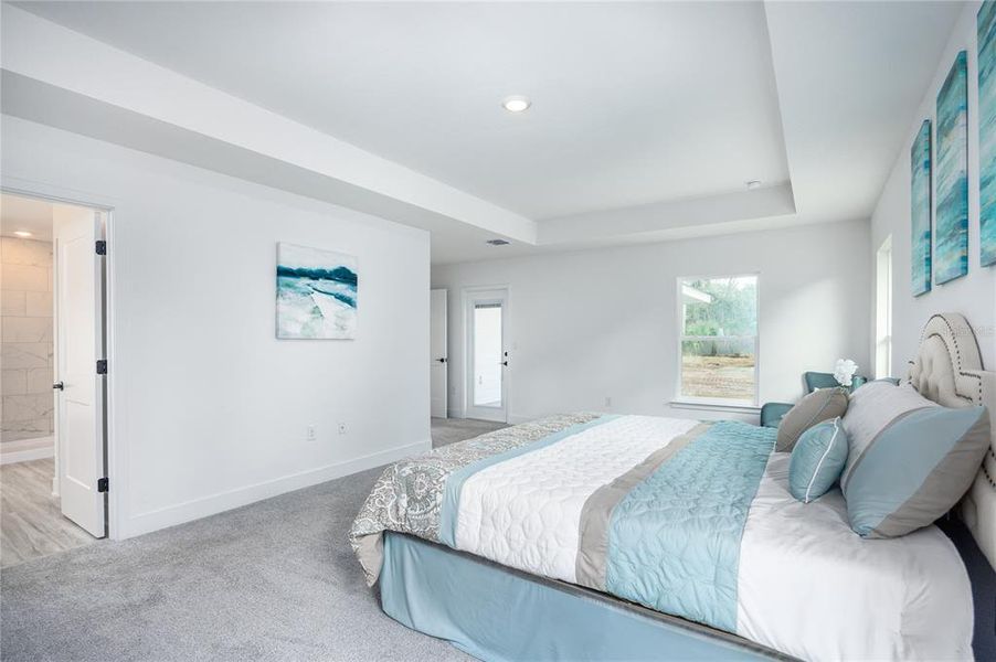 Furnished interior in a model home at Briarwood in Alachua (Image 4).