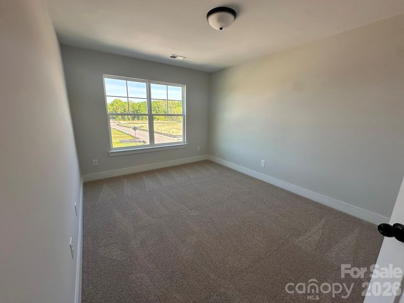 Spacious, unfurnished interior of a new home in Blythe Mill Townhomes, Waxhaw (Image 9).