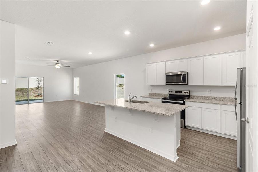 Furnished interior view inside a new home in Peach Crossings, Winter Haven (Image 5).