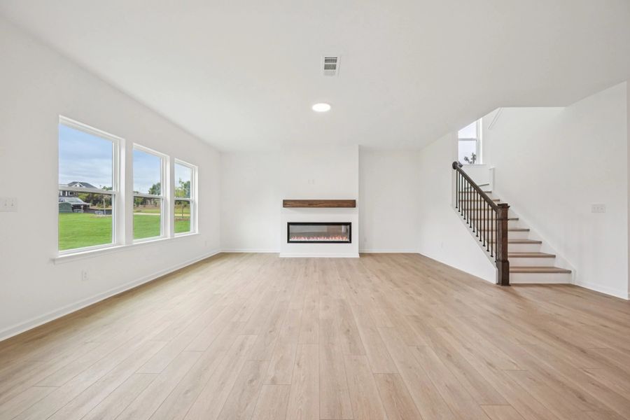 Family Room featuring the AW Collection® Serene - Open space with natural finishes and light.