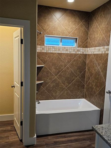 Bathroom with vanity and hardwood / wood-style floors