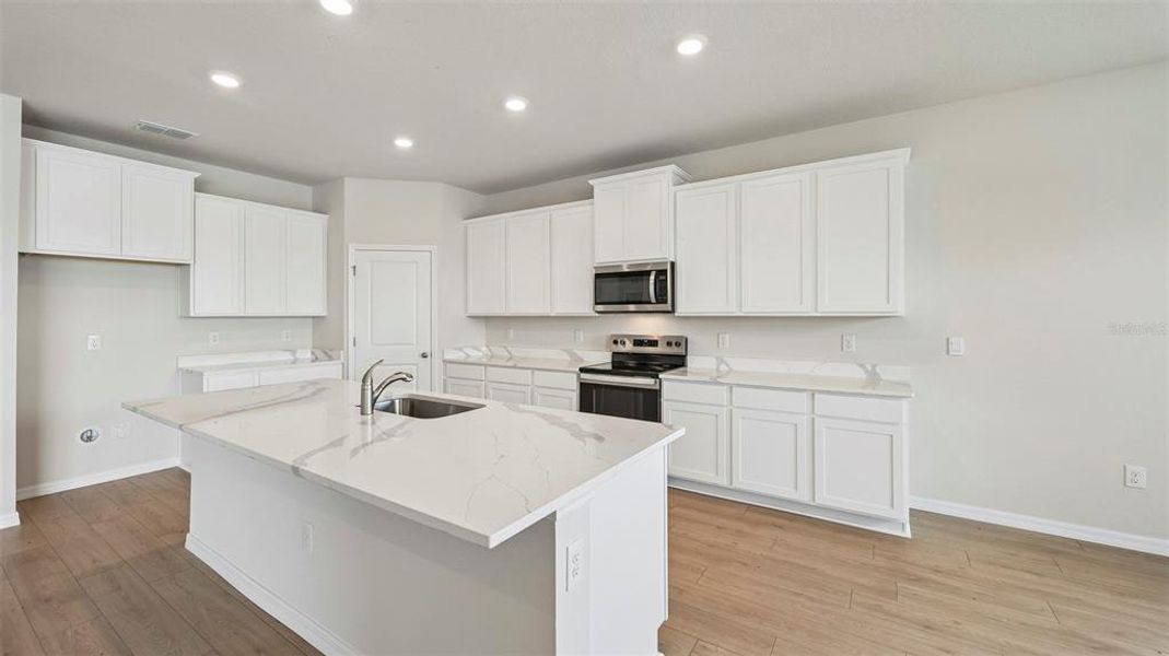 Furnished interior view inside a new home in Oakfield Trails, Parrish (Image 5).