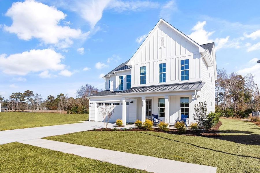Representative exterior photo of a completed home built from the The Hampton by RobuckHomes in Windwater, Hampstead, NC (Image 26).